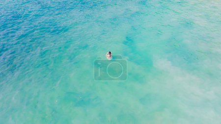 Photo for Paradise beach Phuket Patong. aerial top view amazing freedom beach small white sand beach with perfect nature. white wave hit the rock around island. green forest peaceful. green sea, landscape. - Royalty Free Image