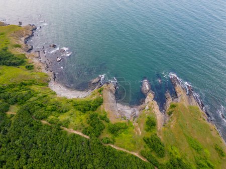 Photo for An aerial top view of the rocky coastline of the Black Sea in southern Bulgaria near Sinemorets town, showcasing its rugged beauty and coastal splendor. - Royalty Free Image