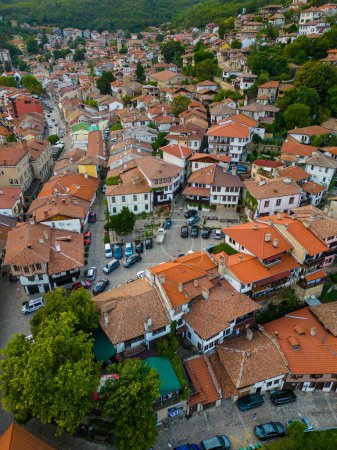 Photo for An aerial view of Veliko Tarnovo reveals a Bulgarian city rich in history and culture, with its beautiful buildings, streets, and picturesque hills. Summer evening. - Royalty Free Image