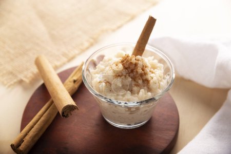 Photo for Rice pudding. Sweet dish made by cooking rice in milk and sugar, some recipes include cinnamon, vanilla or other ingredients, it is a very easy dessert to make and very popular all over the world. - Royalty Free Image