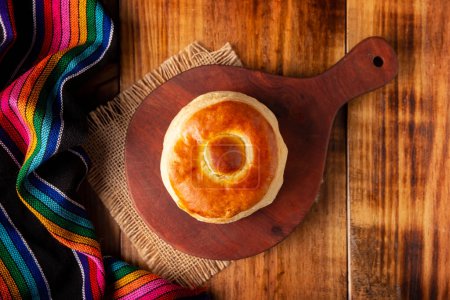 Photo for Bisquet. Also known as Bisquets Chinos, it is one of the traditional breads in Mexico, commonly consumed hot, cut in half and spread with butter and fruit jam. - Royalty Free Image