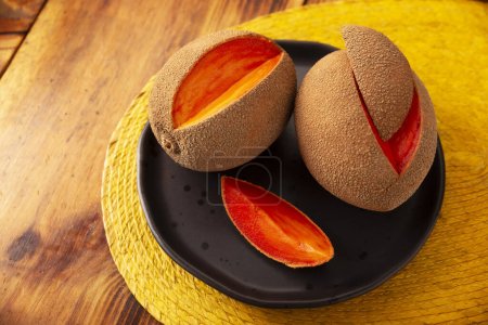 Photo for Mamey, (Pouteria sapota) fruit native to Mexico and other American countries, in some countries it is known as Zapote, Sapote or Red Mamey. - Royalty Free Image