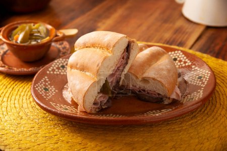 Mexican ham sandwich, in Mexico it is called Torta de Jamon, it is the most popular of the Mexican Tortas and the recipe varies depending on who prepares it, made with bolillo or telera bread.