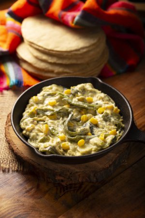Photo for Rajas con Crema. Very popular dish in Mexico that consists of strips of poblano chili with cream, it is served as a garnish or in tacos, it is a typical recipe in Mexican Tacos de Guisado. - Royalty Free Image