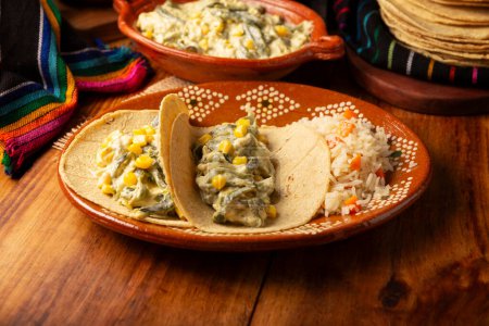 Photo for Rajas with Cream. Very popular dish in Mexico that consists of strips of poblano chili with cream, it is served as a garnish or in tacos, it is a typical recipe in Mexican Tacos de Guisado. - Royalty Free Image