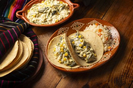 Photo for Rajas with Cream. Very popular dish in Mexico that consists of strips of poblano chili with cream, it is served as a garnish or in tacos, it is a typical recipe in Mexican Tacos de Guisado. - Royalty Free Image