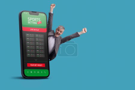 Foto de Hombre ganador alegre y juegos de apuestas deportivas en línea en el teléfono inteligente, espacio de copia - Imagen libre de derechos