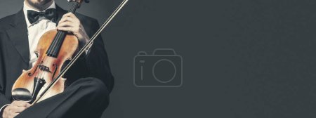 Photo for Professional violin player performing, classical music concept, banner with copy space - Royalty Free Image
