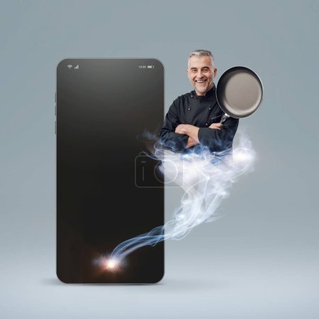 Photo for Smiling chef holding a pan and appearing like a genie, he is coming out from a smartphone: hire a cook online concept - Royalty Free Image