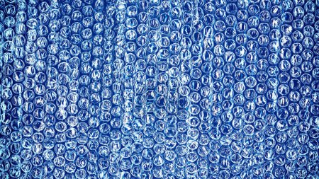 Photo for Plastic bubble wrap sheet background: shipment and protection concept - Royalty Free Image