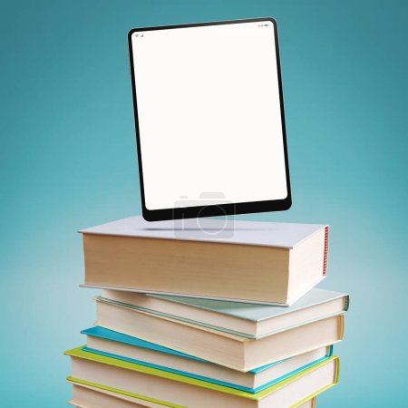 Téléchargez les photos : Tablette numérique avec écran blanc sur une pile de livres : concept d'apprentissage et de livre électronique - en image libre de droit