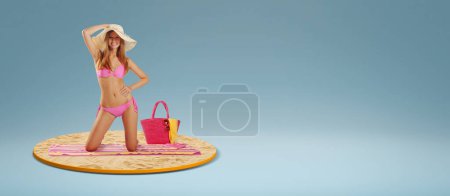 Photo for Smiling beautiful woman wearing bikini and holding her hat, summer vacations and sunbathing concept - Royalty Free Image