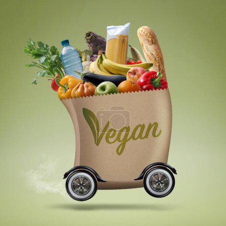 Téléchargez les photos : Sac d'épicerie automatisé sur roues transportant des aliments végétaliens sains, épicerie en ligne et concept de livraison - en image libre de droit