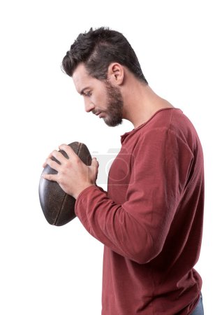 Photo for Young attractive football player playing with ball on gray background - Royalty Free Image
