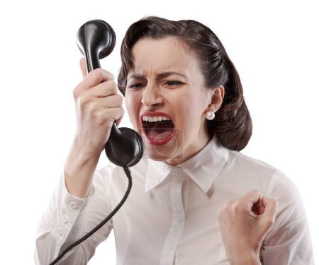Foto de Secretaria agresiva enojada gritando por teléfono, estilo vintage - Imagen libre de derechos