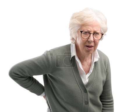 Photo for Suffering senior lady with back pain, she is touching her lower back - Royalty Free Image