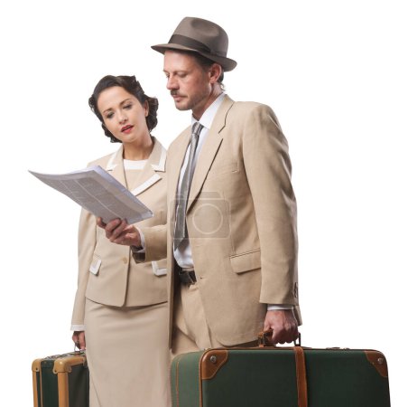 Photo for Elegant couple leaving for vacations with luggage, 1950s style - Royalty Free Image