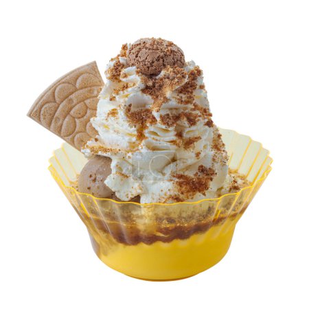 Photo for Delicious amaretto ice cream sundae with wafer and toppings in a plastic cup - Royalty Free Image