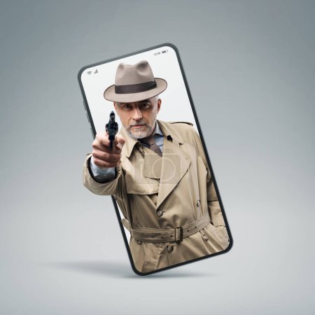 Photo for Retro spy agent pointing a gun in a smartphone videocall - Royalty Free Image