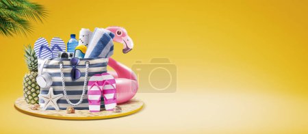 Photo for Beach bag with accessories and cute inflatable flamingo: summer vacation at the beach concept, copy space - Royalty Free Image