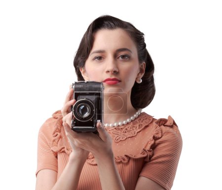 Photo for Beautiful elegant woman taking pictures with a vintage camera - Royalty Free Image
