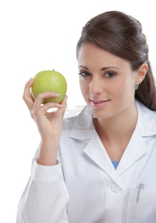 Téléchargez les photos : Nutritionniste femme Médecin tenant une pomme verte - en image libre de droit
