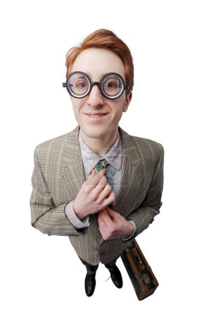Photo for Funny salesman with thick glasses and briefcase, he is standing outside the door and waiting - Royalty Free Image