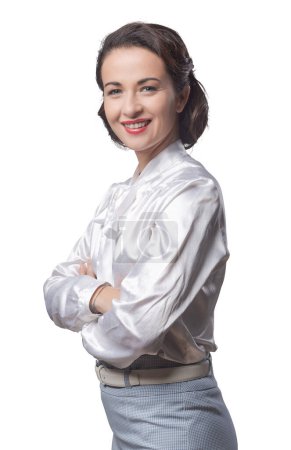 Photo for Confident vintage woman portrait with arms crossed smiling at camera - Royalty Free Image