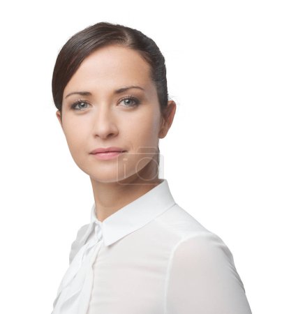 Photo for Charming young woman smiling in white shirt, face close-up. - Royalty Free Image