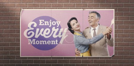 Photo for Vintage advertisement with happy couple and inspirational quote: enjoy every moment - Royalty Free Image