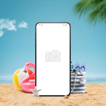 Photo for Smartphone with blank screen and beach accessories on the sand: book your summer vacation online - Royalty Free Image
