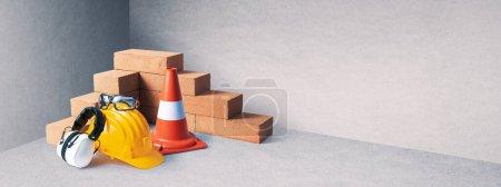 Photo for Manual worker tools, safety equipment and bricks: contractors and construction workers concept - Royalty Free Image