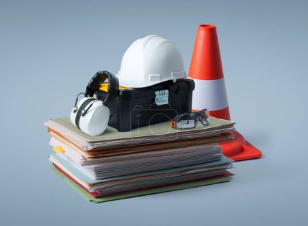 Montón de papeleo, equipo de seguridad y herramientas de trabajo: concepto de construcción y renovación