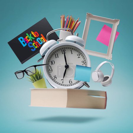 Photo for Back to school concept objects composition: alarm clock and assorted supplies - Royalty Free Image
