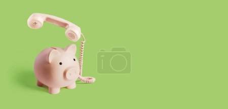 Photo for Piggy bank telephone: banking assistance and insurance concept, copy space - Royalty Free Image