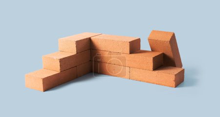 Téléchargez les photos : Mur de briques en construction : concept de construction de bâtiments et de maisons - en image libre de droit