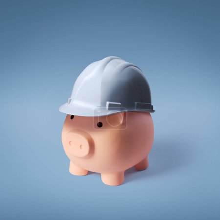 Photo for Piggy bank wearing a safety helmet: construction budgeting and planning concept - Royalty Free Image