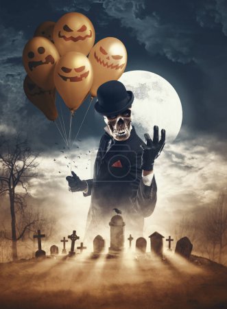 Foto de Afiche de Halloween y terror aterrador con personaje malvado sosteniendo globos y cementerio viejo - Imagen libre de derechos
