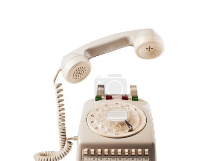 Foto de Recoger una llamada en un teléfono de marcación rotatoria, concepto de comunicaciones, pancarta con espacio para copiar - Imagen libre de derechos
