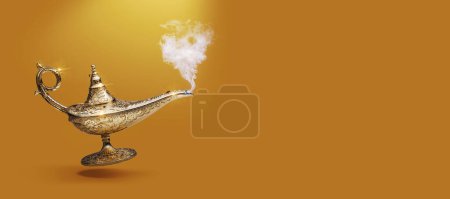 Precious golden magic lamp with smoke on gold background, fairy tales and wish fulfillment concept