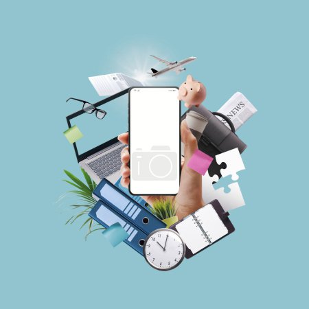 Foto de Mano sosteniendo un teléfono inteligente con pantalla en blanco rodeado de artículos de negocios, gestión empresarial y concepto de tecnología - Imagen libre de derechos