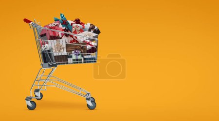Foto de Carro de la compra del supermercado lleno de regalos y espacio de copia, concepto de compras de Navidad - Imagen libre de derechos
