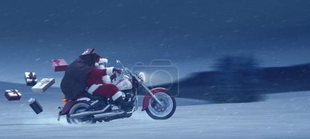 Photo for Brave Santa Claus riding a fast motorbike and riding in the snowstorm, he is carrying Christmas gifts - Royalty Free Image