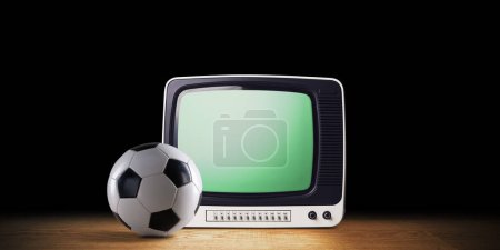 Téléchargez les photos : Télévision vintage et ballon de football : regarder les championnats de football en direct et les sports à la maison - en image libre de droit
