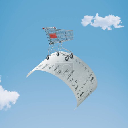 Foto de Recibo volando en el cielo y pequeño carrito de compras: compras de comestibles asequibles y concepto de precios baratos - Imagen libre de derechos