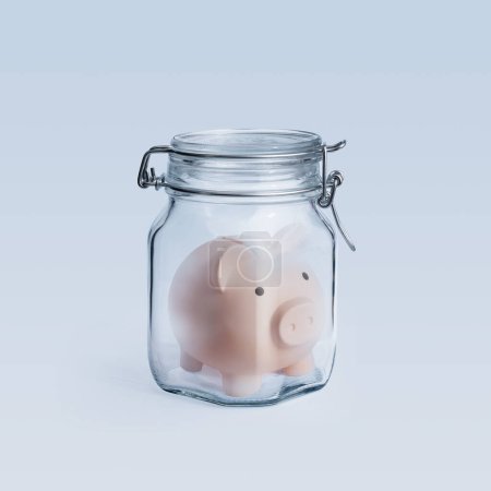 Photo for Piggy bank inside a sealed glass jar, long term investments and funds protection concept - Royalty Free Image