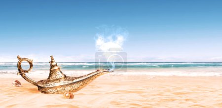 Photo for Magical Genie's lamp on the beach sand, fantasy and fairy tales concept - Royalty Free Image