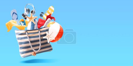 Photo for Flying beach bag with assorted accessories, summer vacations and travel concept, copy space - Royalty Free Image
