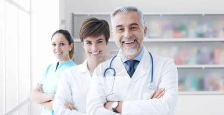 Photo for Portrait of medical professionals at the pharmacy, they are smiling and looking at camera - Royalty Free Image