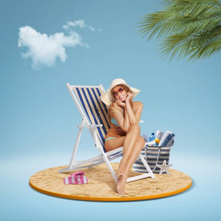Photo for Happy smiling tourist relaxing on a deckchair and sunbathing on the tropical beach - Royalty Free Image